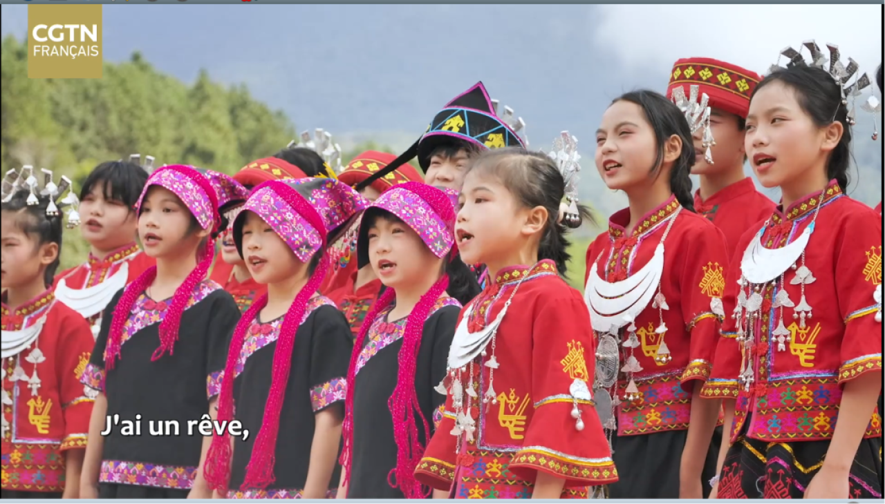 Ethnic children praise France in song